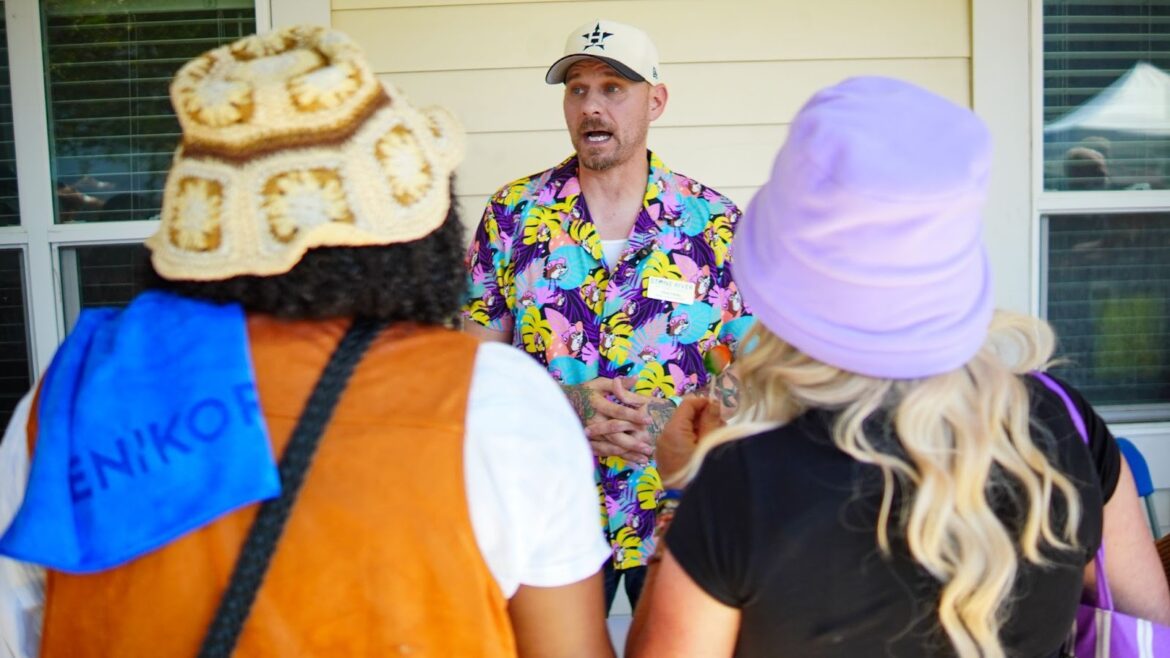 Chris Fahey, Navy veteran and Stone River Recovery advocate, engaging with attendees at the Houston Stand Down event for veterans.
